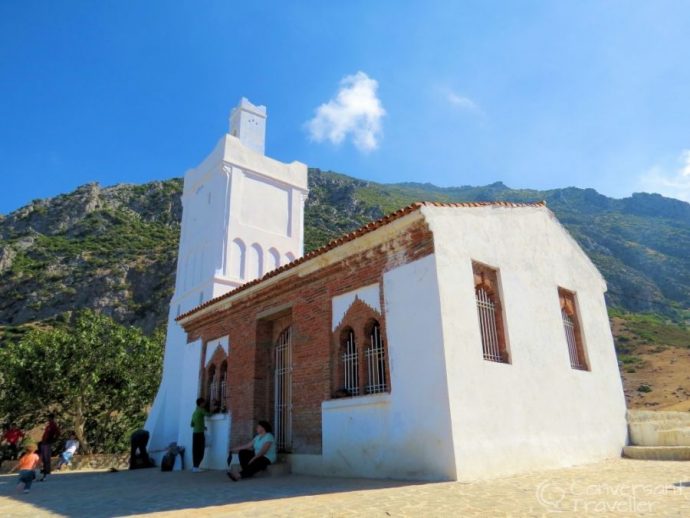 White church building on a hillside