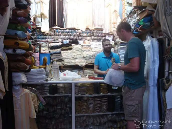 Buying clothes in the Mellah Jewish district of Fes