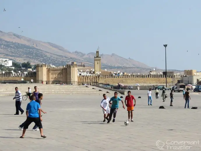 Children playing football in Fes
