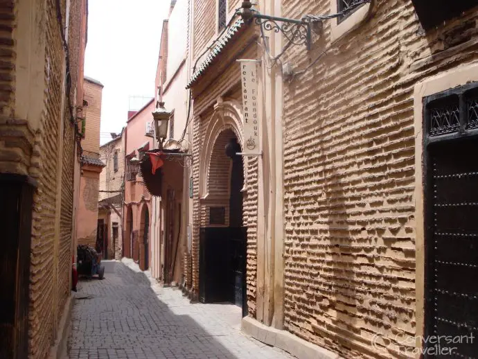 Narrow alleyway with stone buildings either side