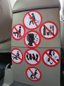 Some taxi drivers have a sense of humour - so which rules did we break in this Bangkok taxi??