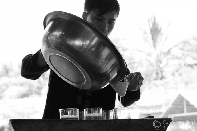 Sia Lee expertly filters the sugar cane juice