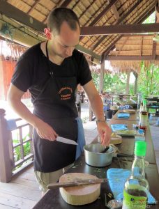 Hubbie enjoying himself cooking, Tamarind Cooking School, Luang Prabang, Laos