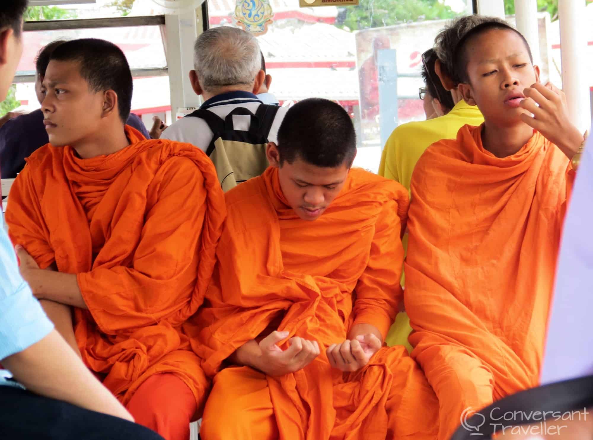 Even monks aren't immune to the dirt that gets everywhere, even your fingernails - on the Chaophraya water taxi
