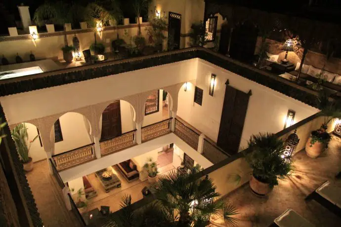 Roof terrace by night at luxury Marrakech Riad Assakina