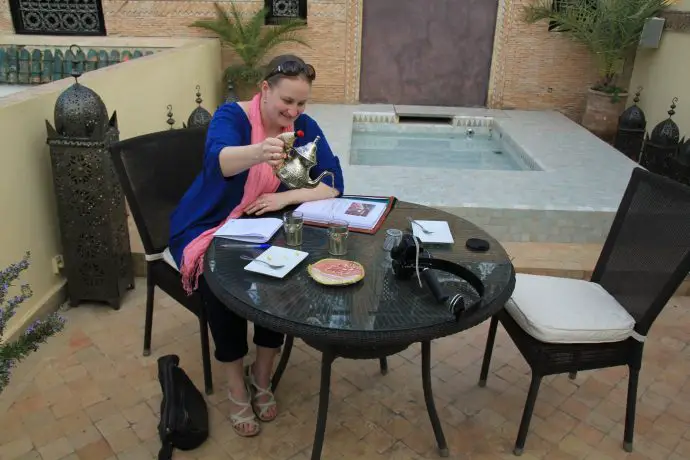 Learning how to pour mint tea at luxury Marrakech Riad Assakina