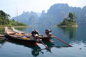 Long tail boats on Cheow Lan Lake, Koh Sok National Park, Thailand