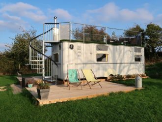 Warwick Knight Caravan - quirky Gloucestershire Glamping Orchard