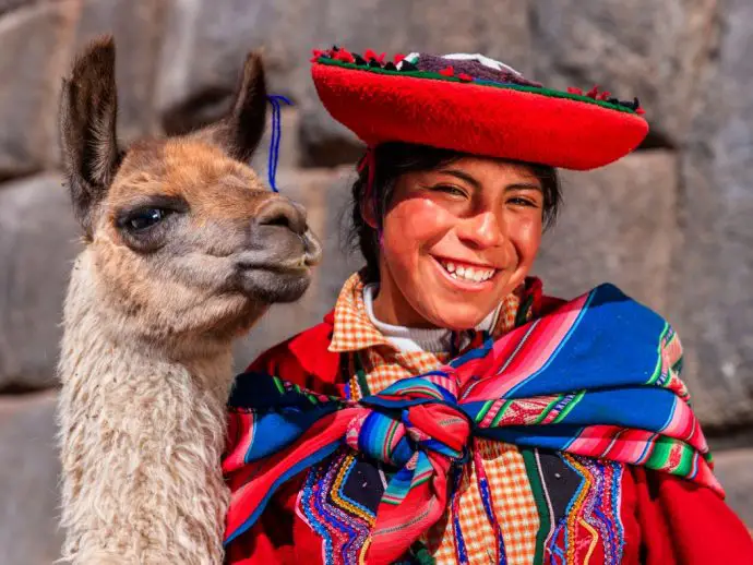 Llama lady in traditional clothing in Cusco