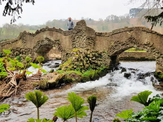 Artistic bridge in the water gardens at Dunster Castle in Exmoor