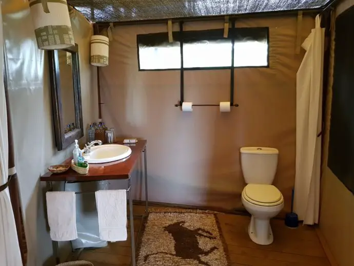 Ensuite bathroom in a tent at Ol Seki on safari in Kenya in the Masai Mara