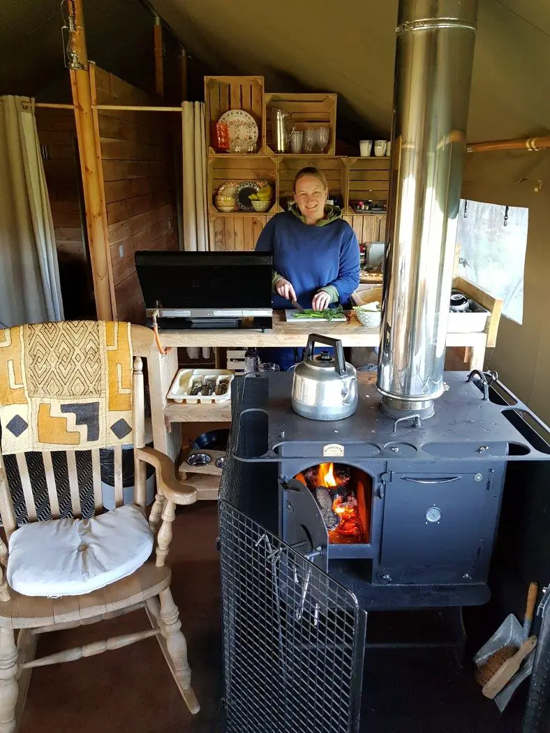 Cooking in the kitchen in a glamping tent