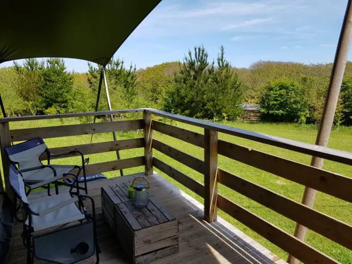 glamping tent decking overlooking fields
