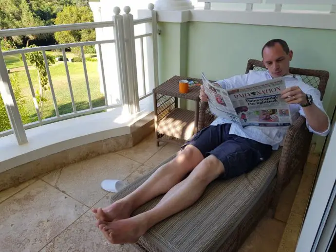 Relaxing on our private balcony at Hemingways Nairobi luxury hotel