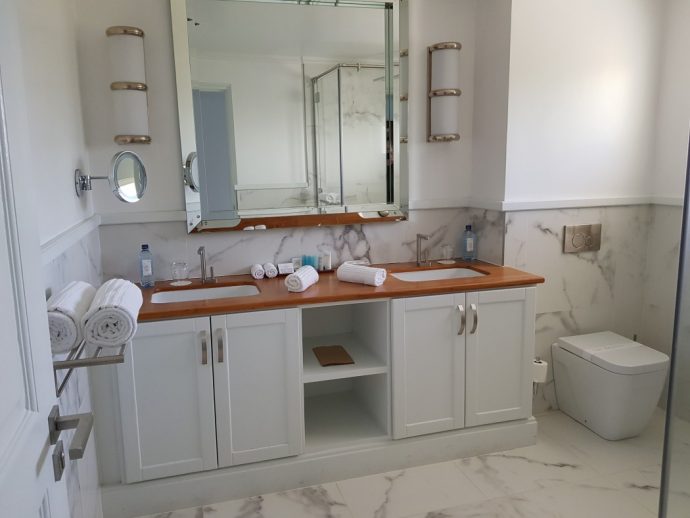 Spacious modern bathroom at Hemingways Watamu