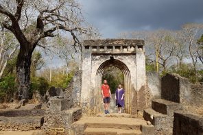 Standing in an archway at Gede Ruins National Monument near Watamu in Kenya