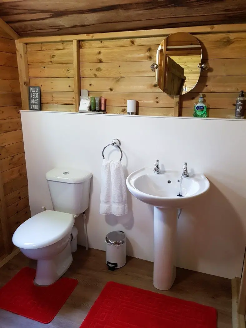 Bathroom with white toilet and sink