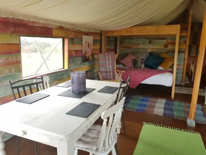 Living area inside Tembo Tent at Wrinklers Wood Glamping in Cornwall
