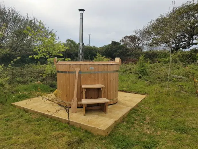 Private hot tub for the Tembo Tent at Wrinklers Wood Glamping in Cornwall