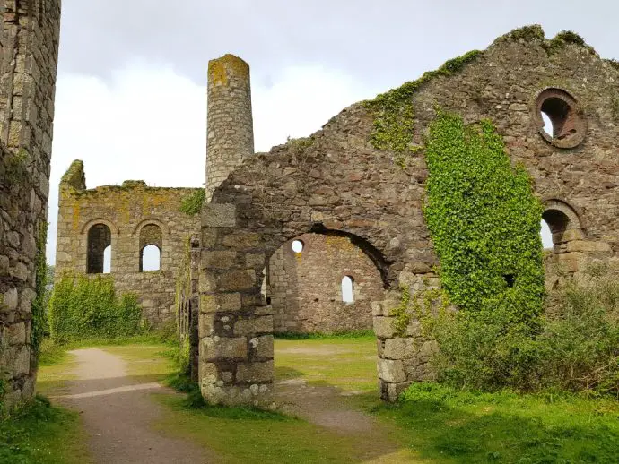 ruined tin mine with ivy on the walls