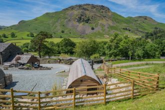 lake district glamping pod on a farm will hills in the background