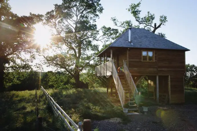 large wooden treehouse exterior for glamping in the Lake District