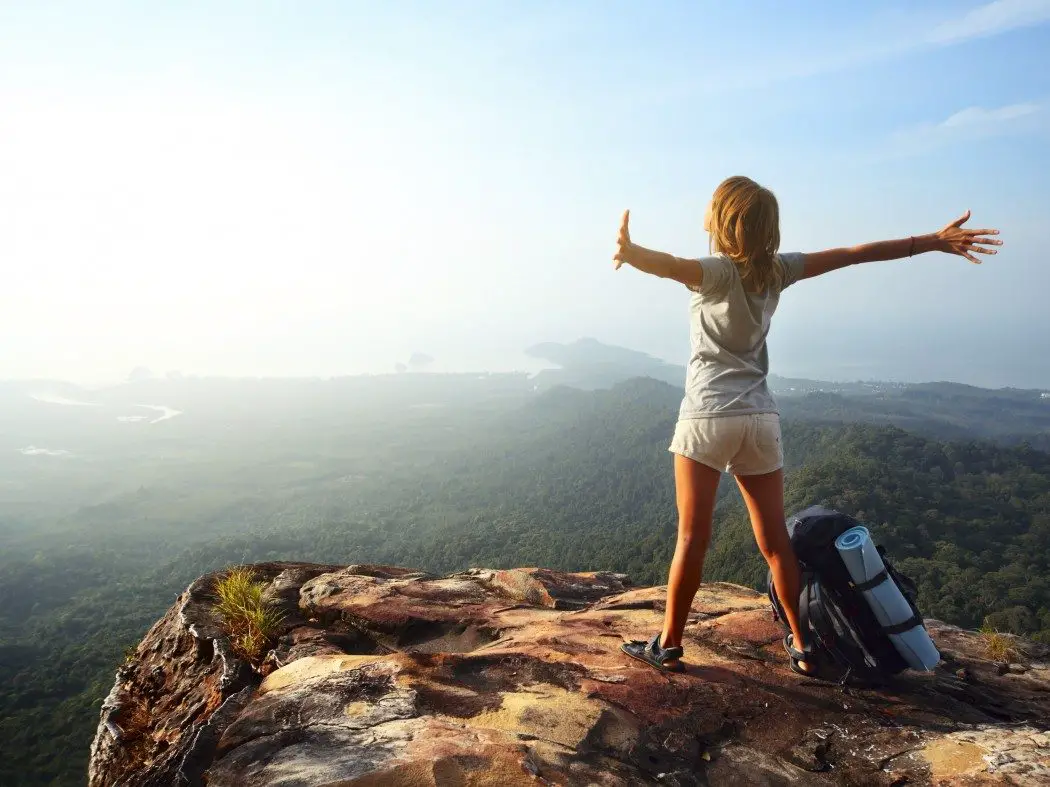 Solo travel backpacker in the mountains