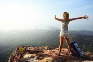 Solo travel backpacker in the mountains