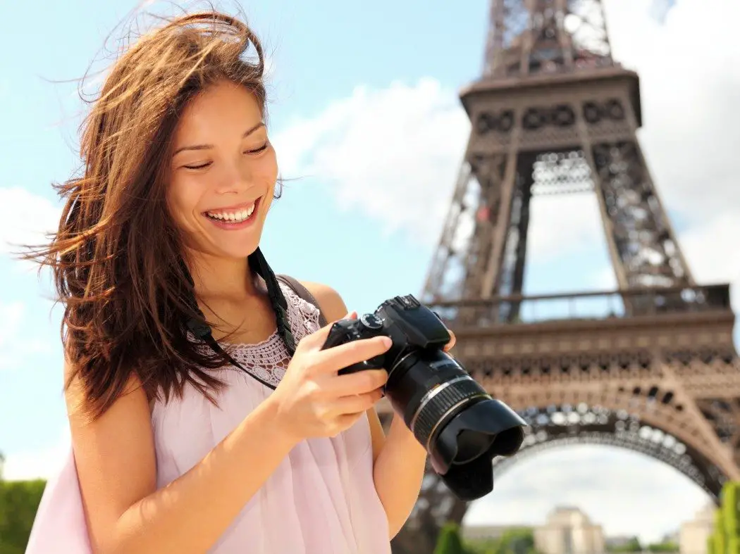 Tourist in Paris with camera