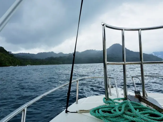 Prow of boat cutting through waves