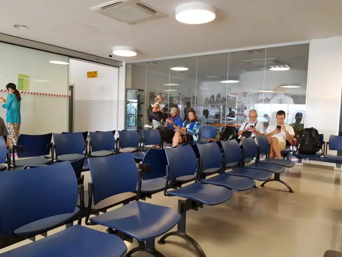 Blue plastic seating in airport lounge