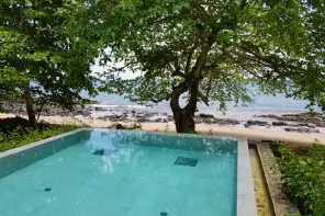 Infinity pool facing the beach and ocean