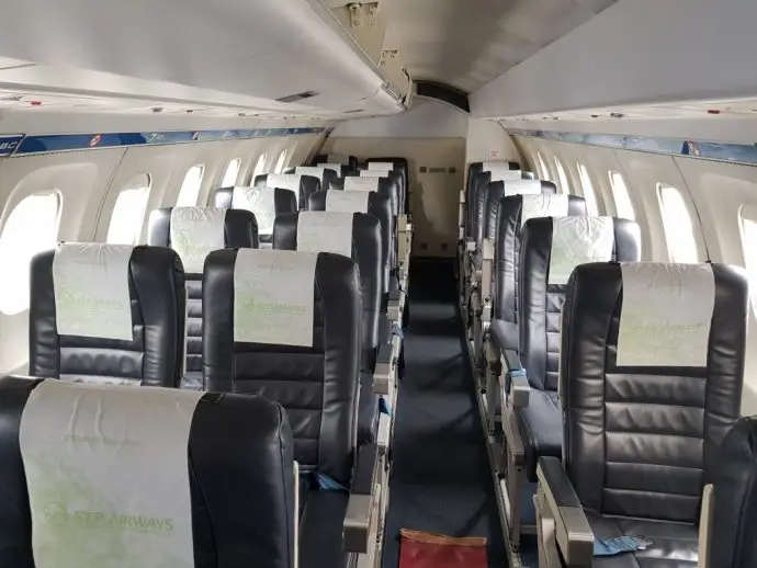 rows of seats inside a plane