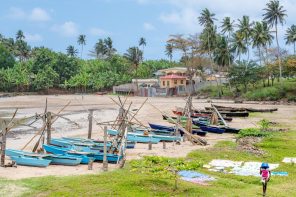 Small fishing village with boats and a beach - one of the best things to do on Sao Tome island