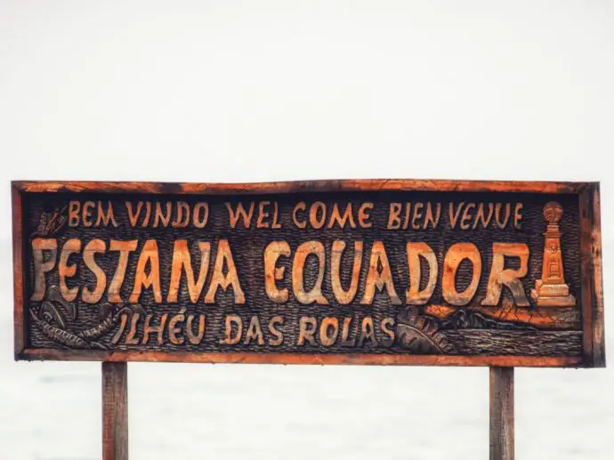 Wooden sign saying Pestana Equador
