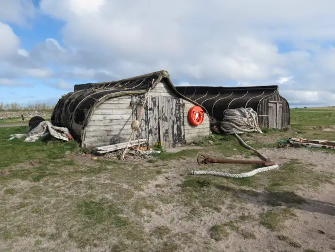 Upturned boats that have been made into sheds
