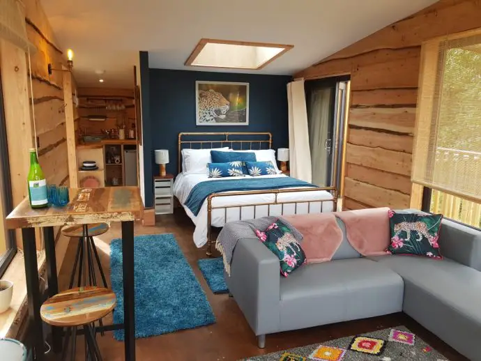 Inside Chui Treehouse at Wrinklers Wood Glamping - hot tub holidays in Cornwall