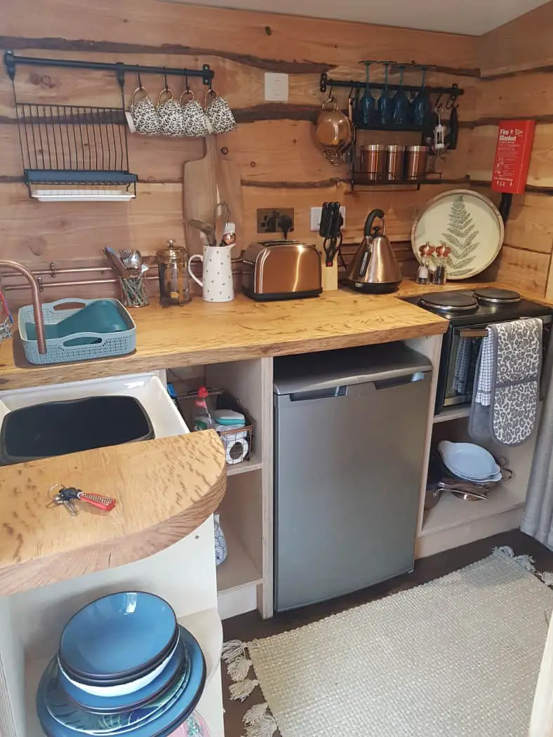 Kitchen area in Chui Treehouse at Wrinklers Wood Glamping - hot tub holidays in Cornwall