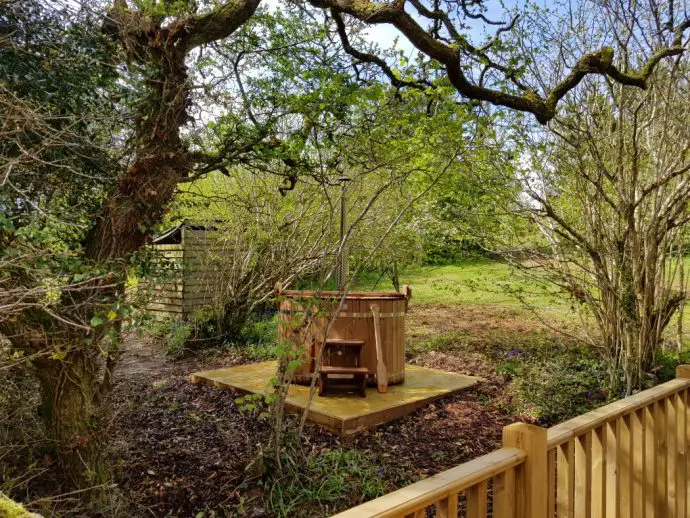 Wood fired hot tub at Wrinklers Wood Glamping - hot tub holidays in Cornwall