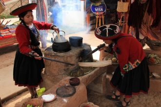 Preparing the dye at a weaving demonstration in Chinchero, Peru