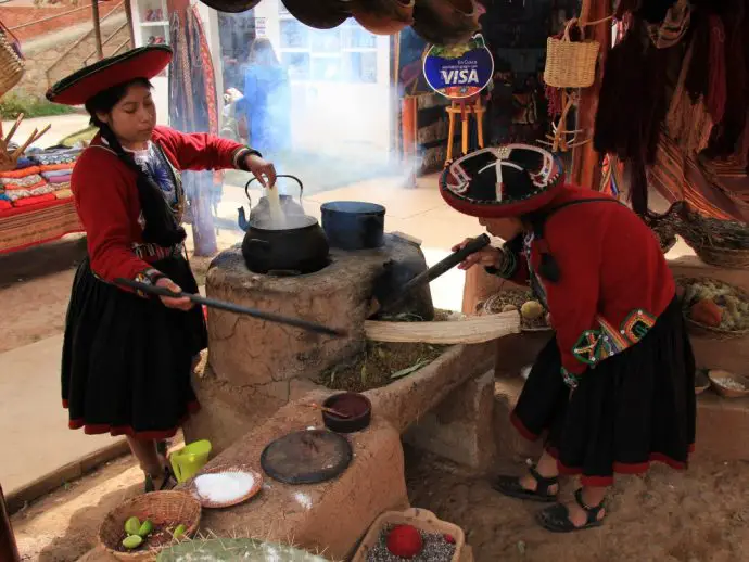 Preparing the dye at a weaving demonstration in Chinchero, Peru