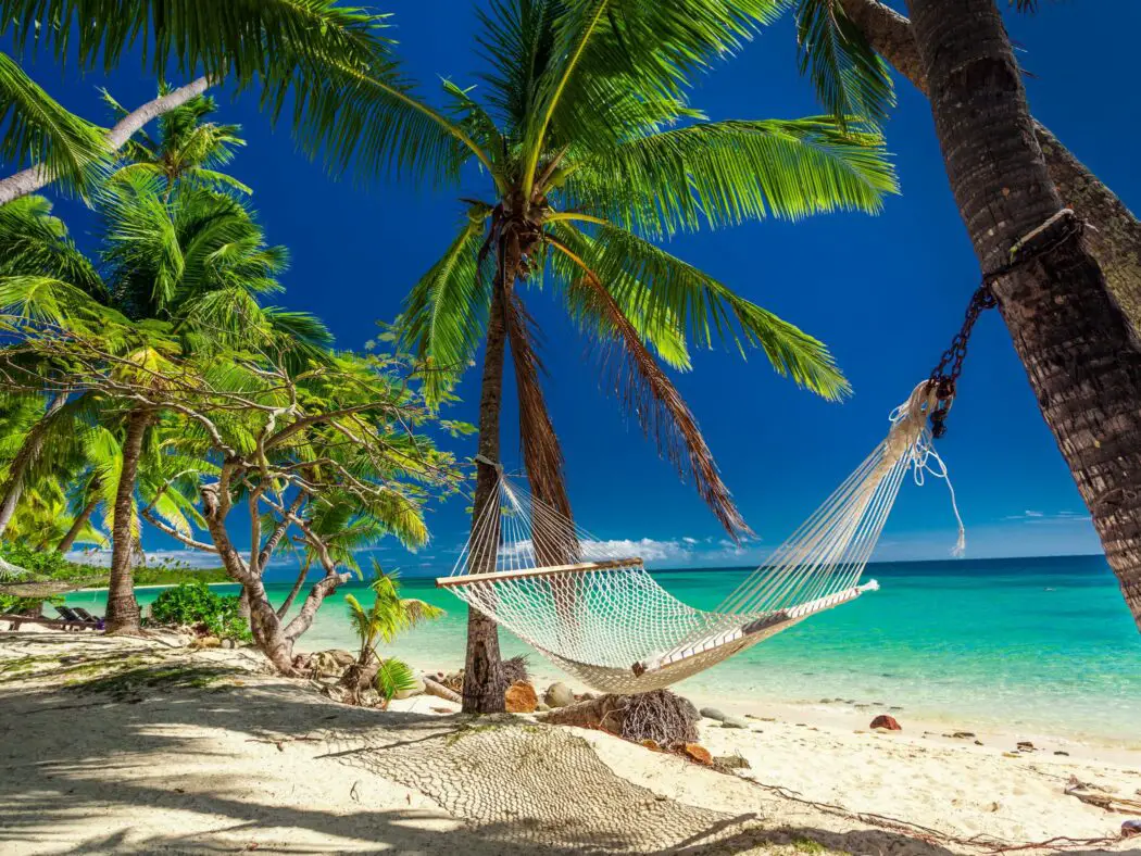 Tropical beach with a hammock in Fiji