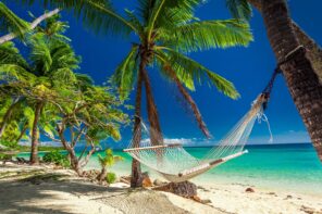 Tropical beach with a hammock in Fiji