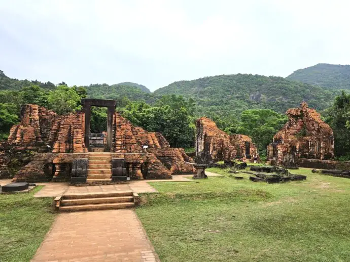 Red brick temple ruins in a forest