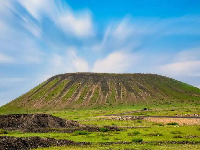 Steep mountain with lush vegetation on it
