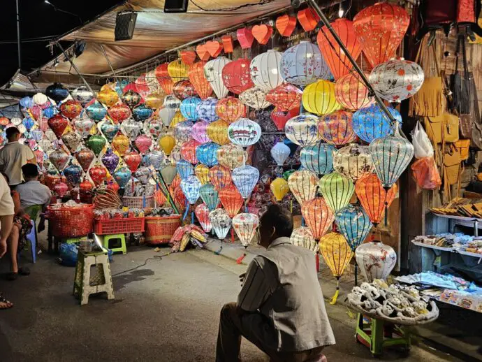 Market store front covered with handing lanterns