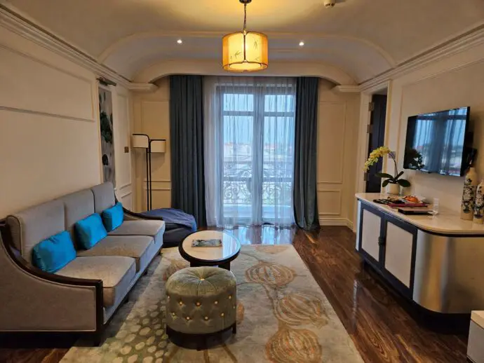Living room with sofas and a large window