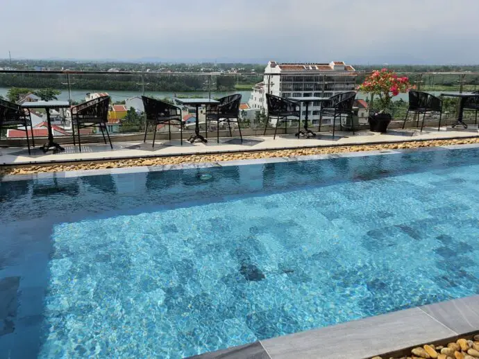 Swimming pool overlooking city rooftops