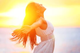 Women with long hair at sunset